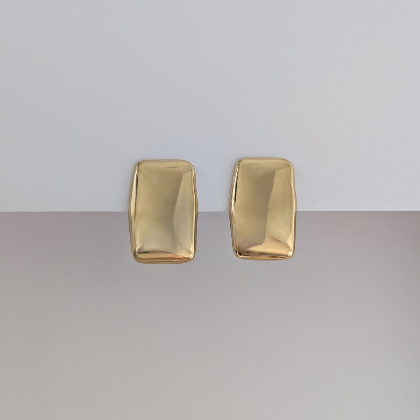 Front view of gold chunky rectangle stud earrings—18k plated, 1.98 × 3.07 cm, mirror‑polish finish.